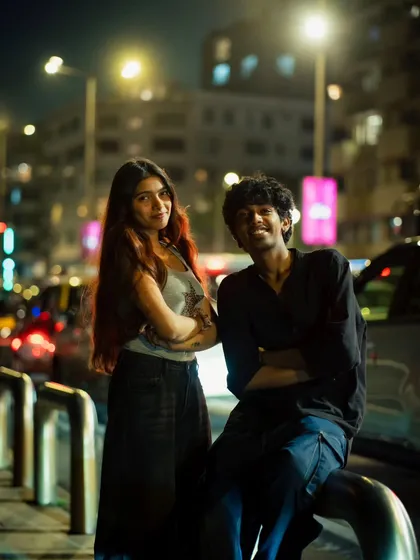 Mumbai's streets at night are one of my favorite backdrops. This is a casual couple portrait that captures the city's energy. It shows that we can find a great shot anywhere, anytime.