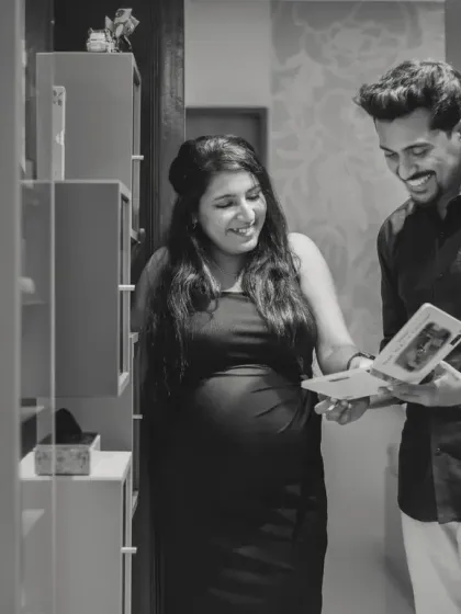 Another angle of a sweet, candid moment. These black and white photos have a timeless quality that makes the memory even more special.