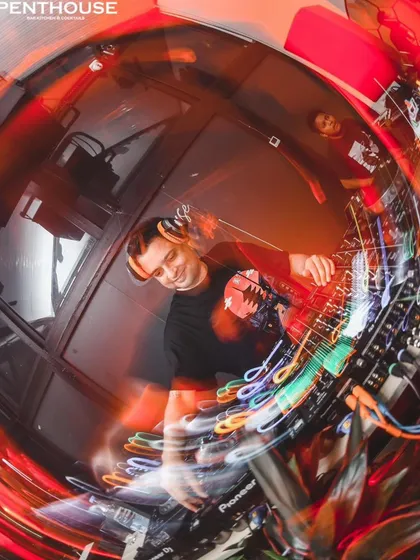 A dynamic, motion-blurred shot from my set in Siliguri. This image captures the high-speed energy and movement of a peak-hour techno set.