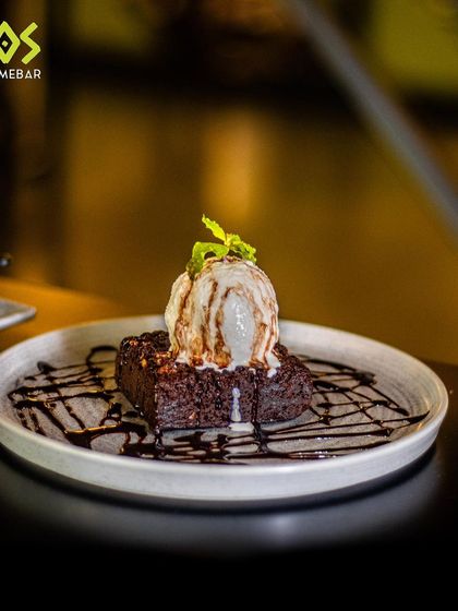 The choco-luscious brownie with ice cream that I'm obsessed with. It's pure gooey goodness and the perfect sweet fix.