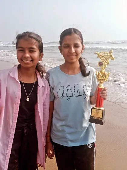 My female champions celebrating their victory at the beach. They fought hard and earned their trophies.