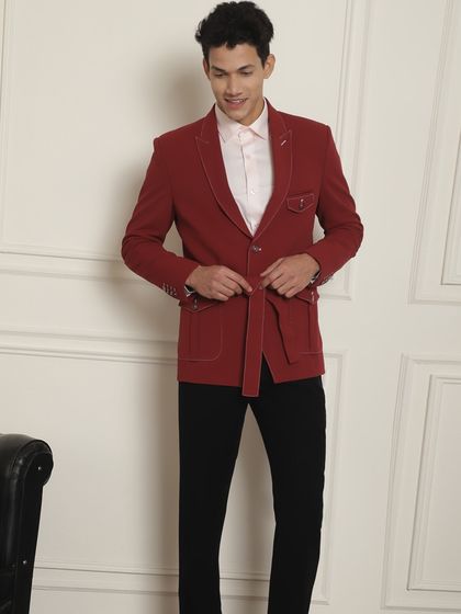 The full look of our red blazer with a tie-belt, a modern and stylish choice for any party.