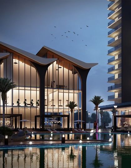 The clubhouse, viewed from the waterbody at night, becomes a glowing beacon for the community. The architecture's reflection on the water enhances the sense of tranquility and luxury, creating a stunning focal point for the residential development.
