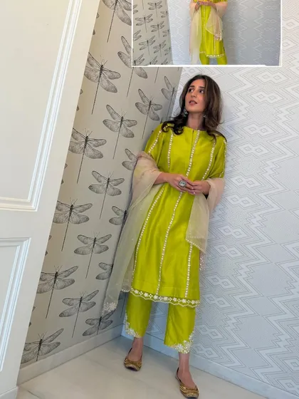 Simple, elegant, and fresh. Dhvani Bhanushali in a vibrant lime green kurta set from Madzin Label, paired with beautiful silver jhumkas from Sangeeta Boochra.