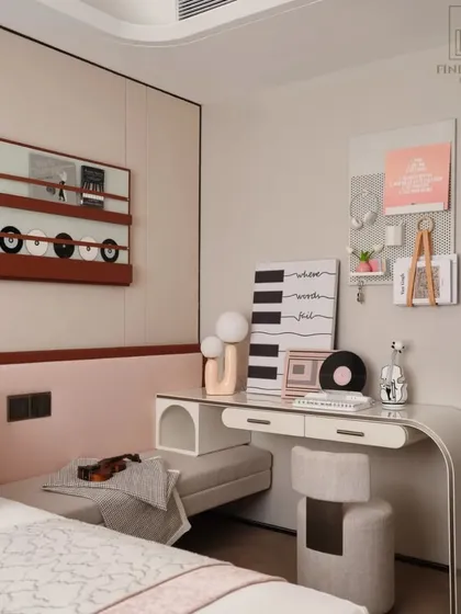 This bedroom is designed for a music lover, featuring a custom wall installation resembling a record player and vinyls. The soft pink and terracotta color scheme creates a warm and inviting atmosphere.
