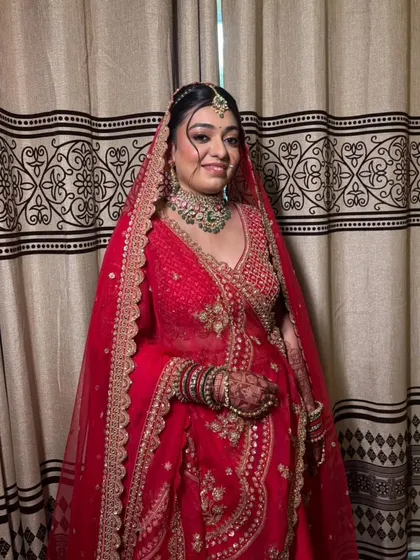The final look with the dupatta set perfectly. I ensure every element, including the draping, is flawless so the bride can walk into her ceremony feeling confident and beautiful.