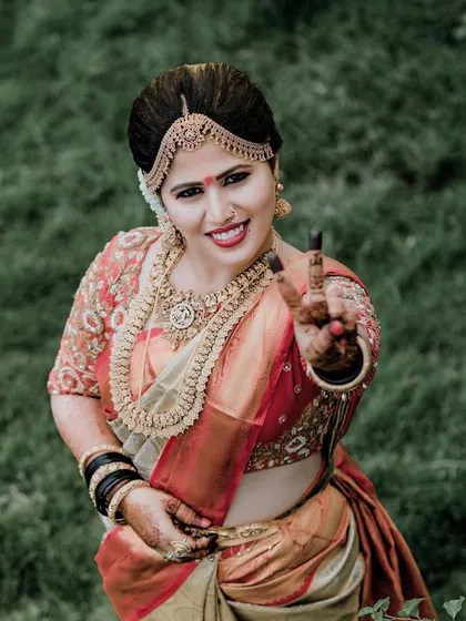 A fun and happy shot of the bride. The long-lasting makeup ensures she looks just as fresh and vibrant hours into the ceremony as she did at the beginning.