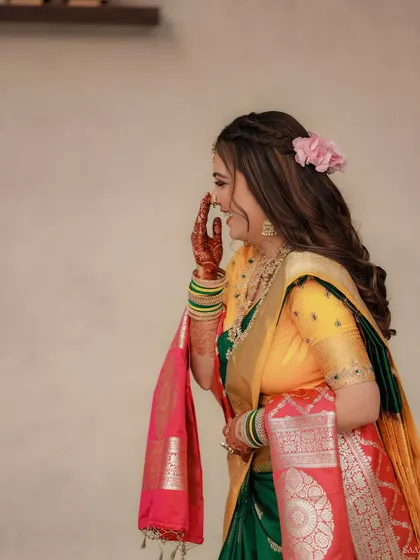 A candid moment of laughter, showing the bride's natural joy.
