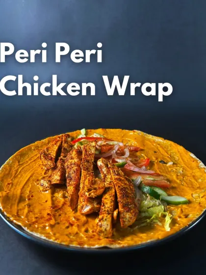 Savor the spice with our delicious Peri Peri Chicken Wrap. This open-faced wrap is loaded with seasoned chicken and fresh veggies, offering a perfect guilt-free indulgence.
