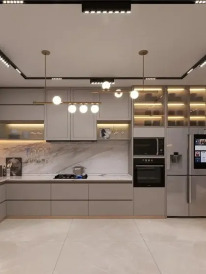 A modern modular kitchen is the heart of the home. This L-shaped design features handleless cabinets, integrated smart appliances, and a breakfast counter, all built with precision in my factory.