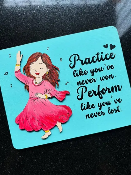 A close-up of the custom magnet for Phulawa Khamkar, showing the hand-painted details on the dancer's dress.