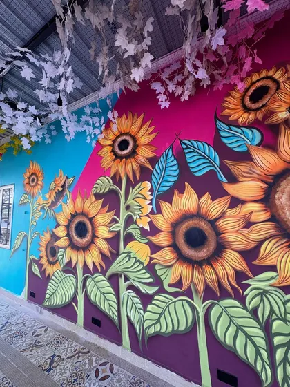 Transforming this cafe wall with a field of giant, vibrant sunflowers was an absolute joy. This shows how I can turn a large commercial space into a bright, energetic, and Insta-worthy destination.