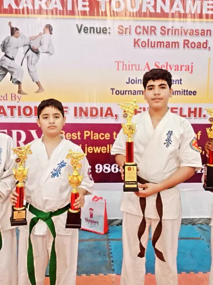 The winning team from Delhi, proudly displaying their trophies. Their success is a success for the entire academy.