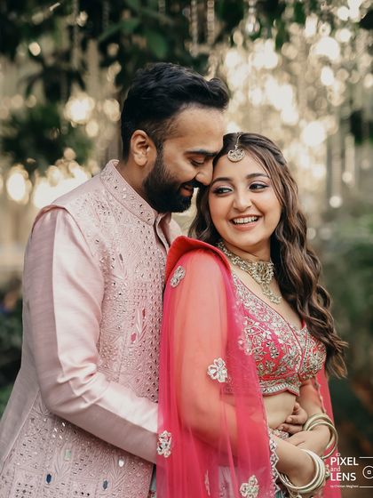 A quiet, stolen moment between the bride and groom amidst the Haldi celebrations. It's these candid shots, full of genuine emotion, that truly capture the essence of the day.