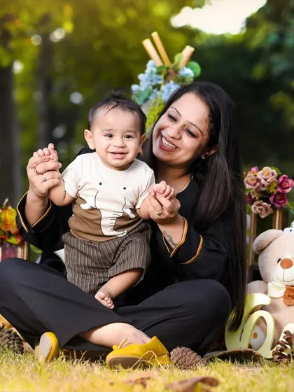 The bond between a mother and her child is so precious. This photo captures a moment of pure joy and love during an outdoor shoot.