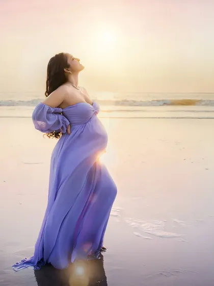 There is a special magic where the sun meets the sea. My beach sessions are timed for that perfect golden hour glow, creating a dreamy, ethereal backdrop for your maternity portraits. Here, the ocean's calm rhythm mirrors the peaceful anticipation of new life.