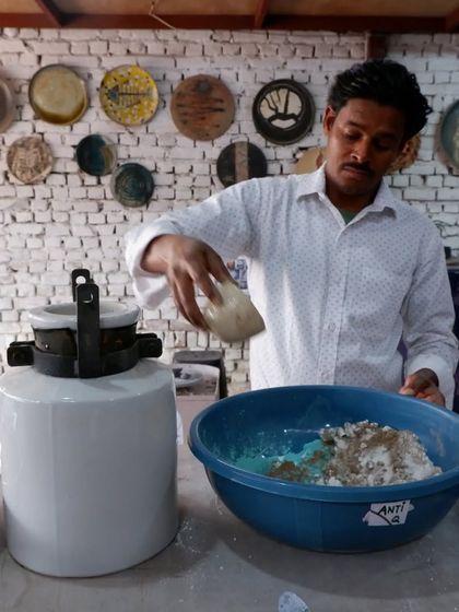 I am mixing different oxides and materials to create our unique Raku glazes. It's a bit like chemistry, experimenting to get just the right colors.