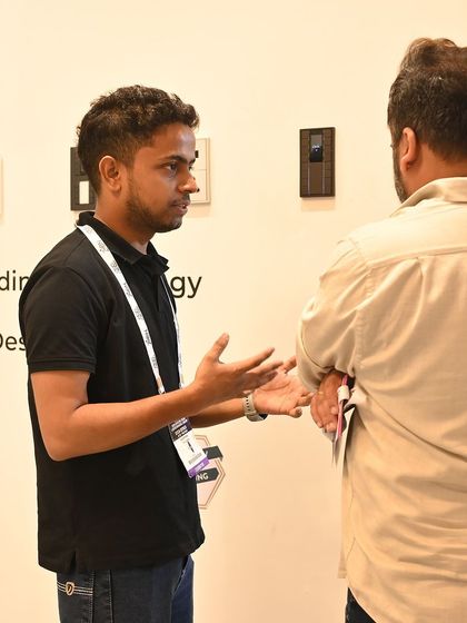 A team member explaining the technical details of our automation systems. We pride ourselves on our deep technical knowledge.