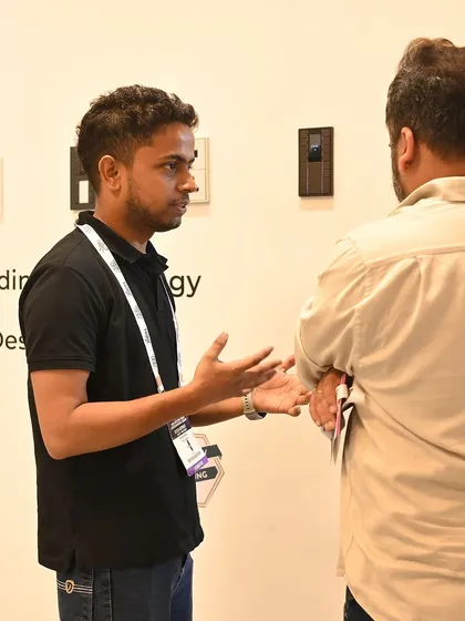 A team member explaining the technical details of our automation systems. We pride ourselves on our deep technical knowledge.