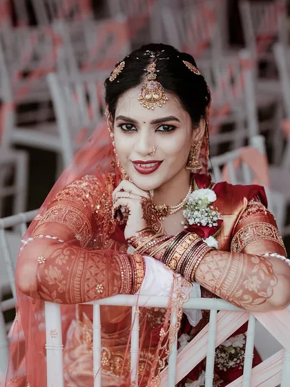 A bridal portrait is more than a photo; it's a story of grace and anticipation. I focus on the fine details, from the intricate henna to the quiet smile, to create a timeless image of the bride on her special day.