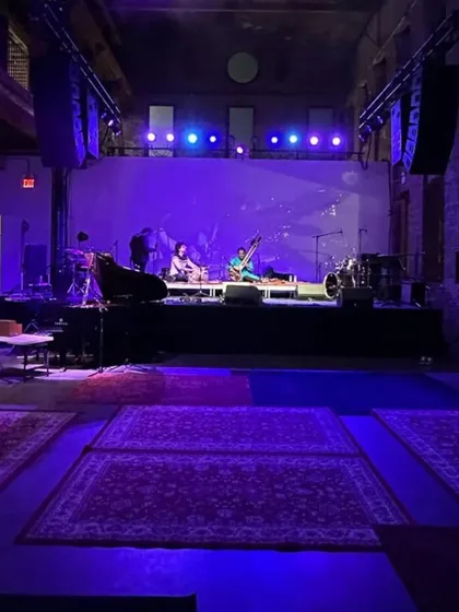 The stage is set for our performance at the Ragas Live Festival in New York. The carpets on the floor create an intimate, traditional baithak feel.