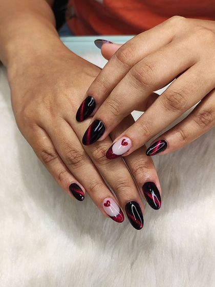 Another view of the dark romantic set, showing the glossy finish and the almond shape of the extensions.