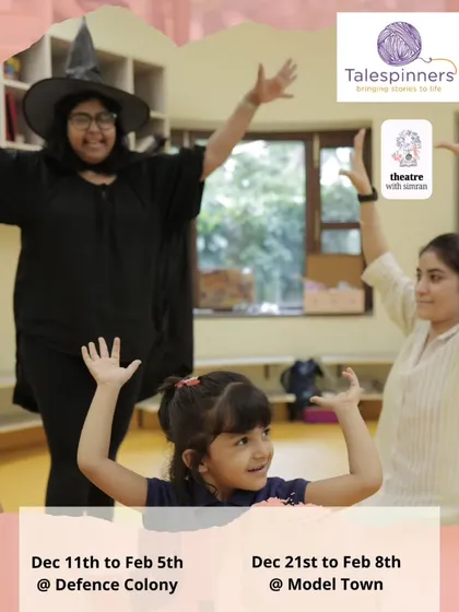 A facilitator dressed as a witch engages a young girl in an expressive movement game.