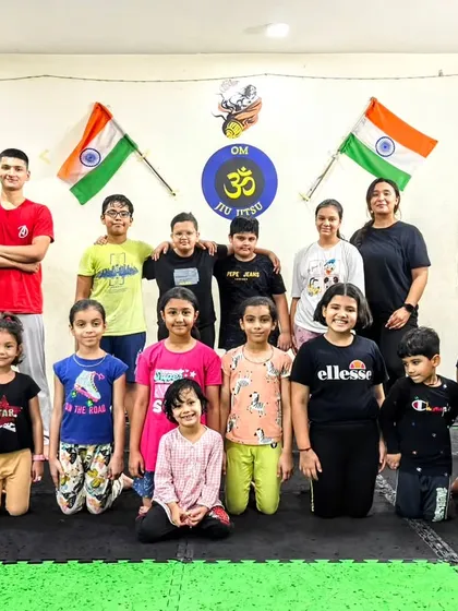 Training is more productive when everyone enjoys it. This group photo from one of our summer camps shows the happy and fun vibe we cultivate.
