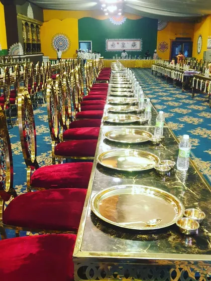 For traditional ceremonies, we offer elegant seated dining arrangements complete with authentic brass thalis. This setup reflects our commitment to providing a classic, royal dining experience that honors your cultural traditions.