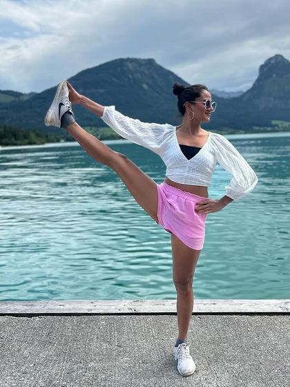 Life is a flow, not a race. Practicing Utthita Hasta Padangusthasana by the water reminds me to trust the process, enjoy the path, and let the journey guide me.