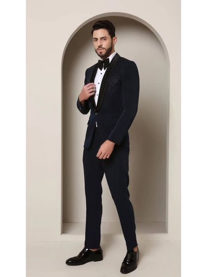 Another view of the Prism Riviera tuxedo, showing how the handcrafted geometric beadwork catches the light. This piece is a testament to my dedication to combining timeless elegance with modern, boundary-pushing design.