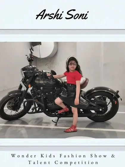 Welcome to the show, Arshi Soni. Posing with a motorcycle, she already has superstar confidence.