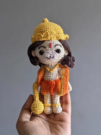 My handmade Lord Hanuman doll, complete with his Gada (mace) and crown. A perfect representation of devotion and strength.