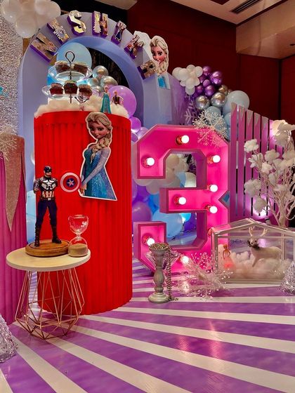 A magical fusion of themes for a repeat client. We merged the heroic world of superheroes with the enchanting elegance of Frozen, creating a unique celebration where a "diva" and a "man in themaking" could both have their dream party.