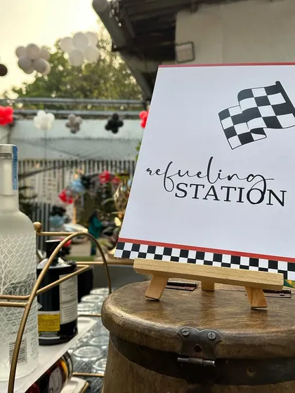 The "Refueling Station" at a race car-themed party. We love creating fun, thematic names and stations for food and drinks that add to the immersive experience.