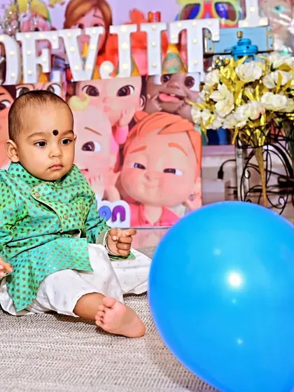 The birthday boy, Devjit, enjoying his Cocomelon-themed party. We design our setups to be a perfect backdrop for capturing precious photos of your little one's milestone.