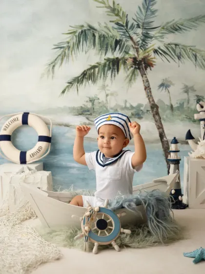 This little sailor is ready for an adventure! Themed baby photoshoots like this are a great way to get creative and have fun.