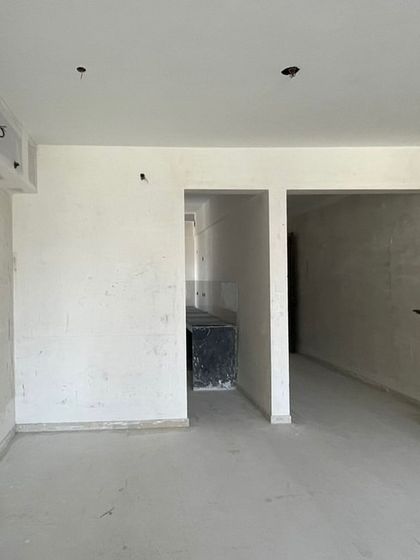 An empty room during the initial site visit. This is where our process begins, assessing the potential of the space and planning the architectural and interior changes needed to create a home rooted in timeless elegance.