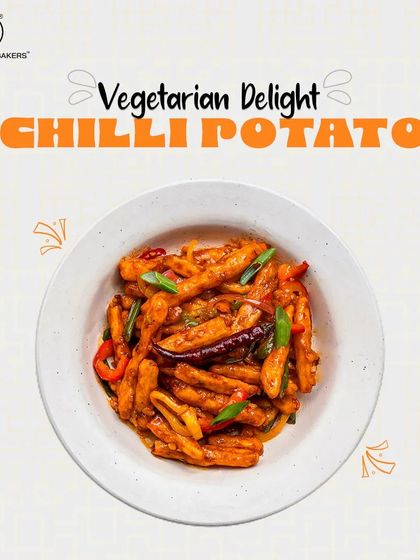 A plate of our popular Chili Potato. Crispy fried potato fingers are tossed in a sweet and spicy sauce with onions and bell peppers for a truly addictive snack.