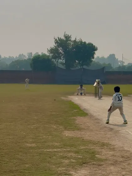 A view from behind the stumps as Sagar dominates the bowling.