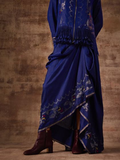 A detail shot from a campaign focused on Indian textiles. I styled this draped indigo skirt with ankle boots to create a contemporary, indo-western look that highlights the intricate prints and unique silhouette of the garment.