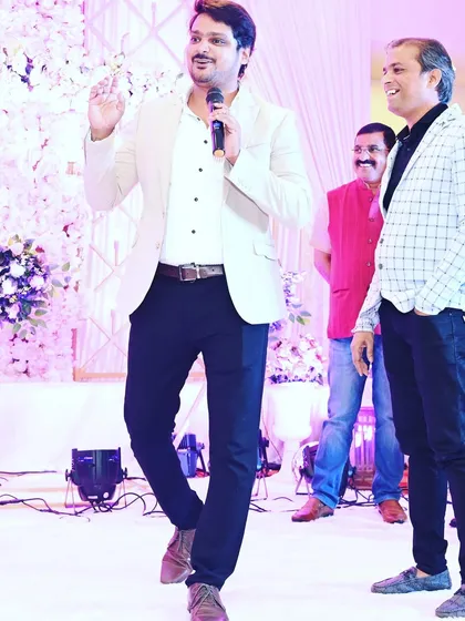 A full-length shot of me hosting an engagement. A professional and confident presence is key to being an effective emcee.