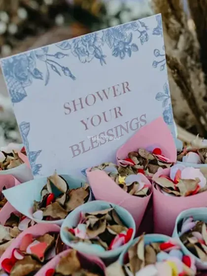 "Shower Your Blessings." Cones filled with flower petals and rice were prepared for guests, a small but meaningful detail that allows everyone to participate in the celebration.