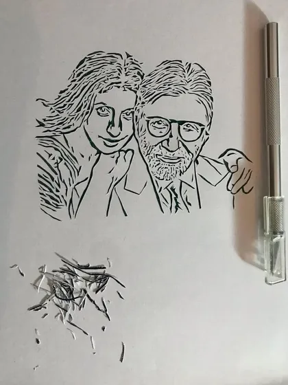 Here you can see the delicate lines of the portrait next to my craft knife. Creating this piece was a true labor of love.