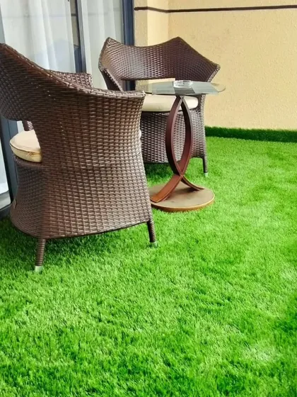 A simple balcony can become a comfortable, green retreat with my artificial grass. This installation shows how easily you can create a soft, clean, and usable outdoor space, perfect for a small seating area.