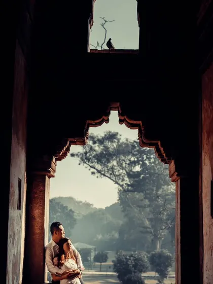 History and romance come together in this shot from a pre-wedding session at Delhi's Lodhi Garden. We used the ancient archway to create a natural frame, highlighting the couple's intimate moment against a backdrop of timeless architecture.