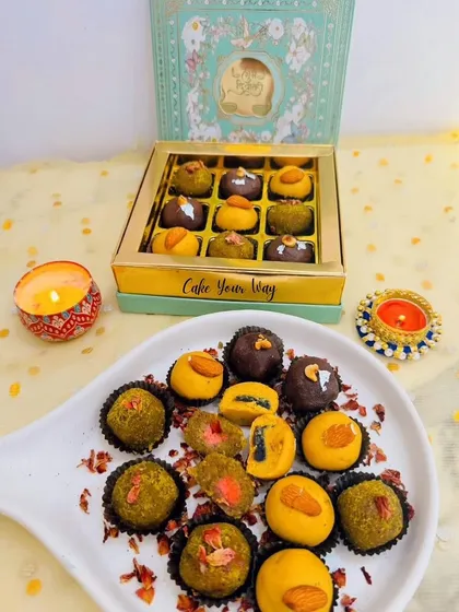 A beautiful platter of my fusion Diwali sweets. Here you can see the rich Pistachio Mafroukeh and Besan Laddoos, ready to be enjoyed or packed into a gift box.