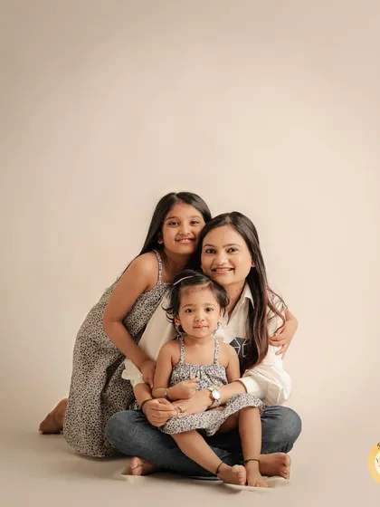 A beautiful portrait of a mother with her two daughters. We love capturing the special bond shared between mothers and their children at every age.
