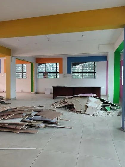 The space before we transformed it into a celestial-themed dining area. It was a large, empty room with debris, waiting for a new vision.