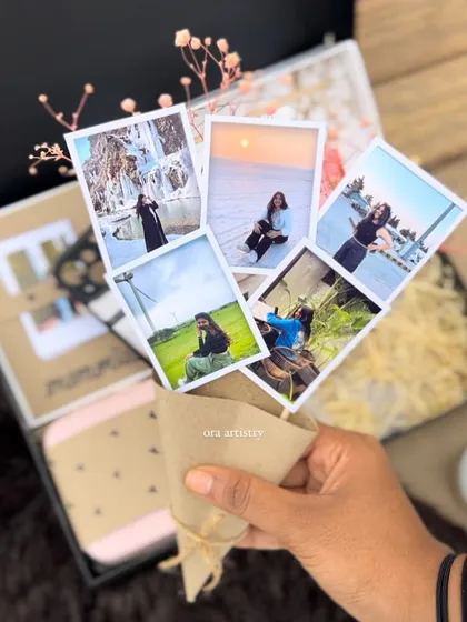 I turn your favorite photos into a beautiful, handheld photo bouquet. It's a unique and personal way to display cherished memories, making it a standout piece in any gift hamper.